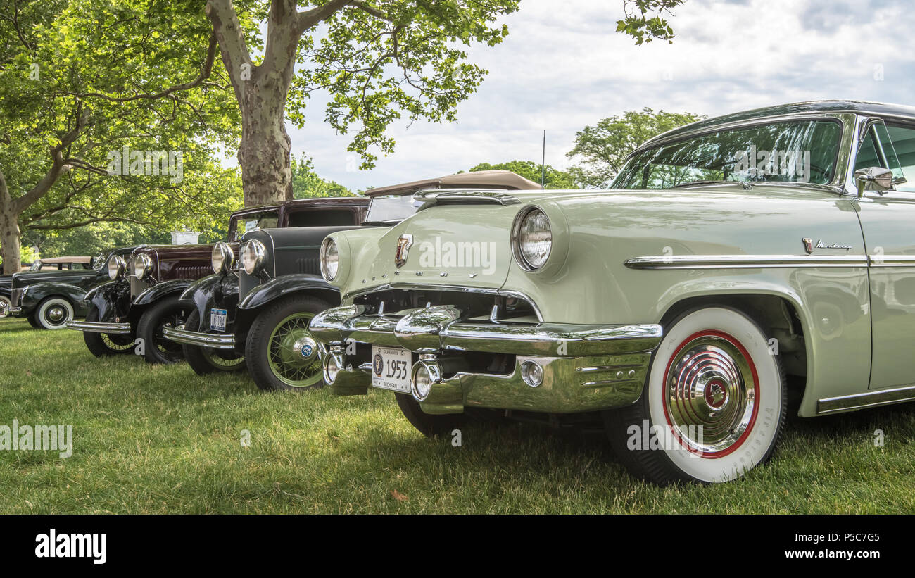 DEARBORN, MI/USA - JUNE 16, 2018: 4 vintage cars including a 1953 Mercury Monterey at The Henry Ford (THF) Motor Muster show, at Greenfield Village. Stock Photo