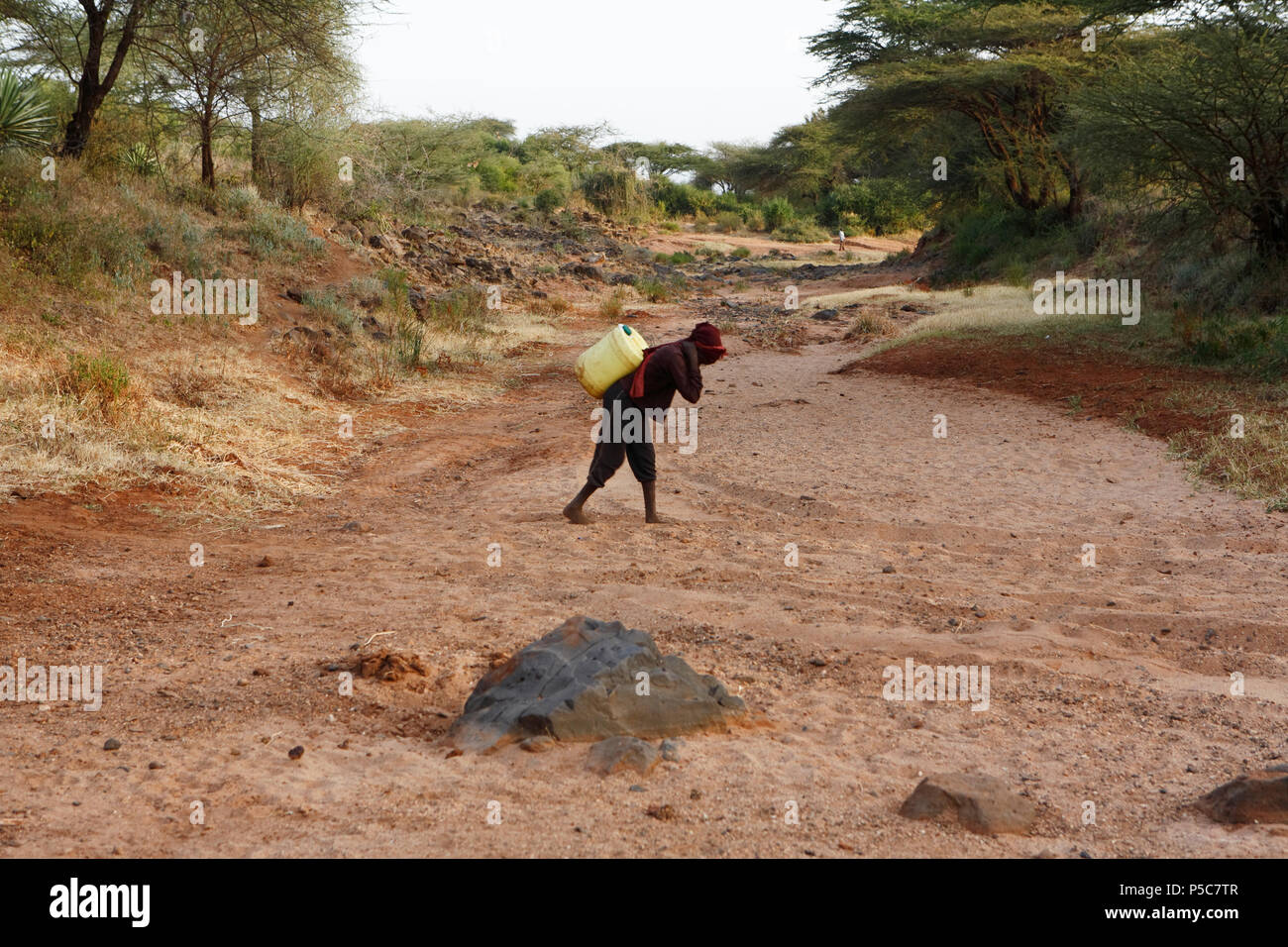 Dried out river bed near of provincial town Isiolo. For years northern Kenya has been suffering particularly from lack of water. Stock Photo