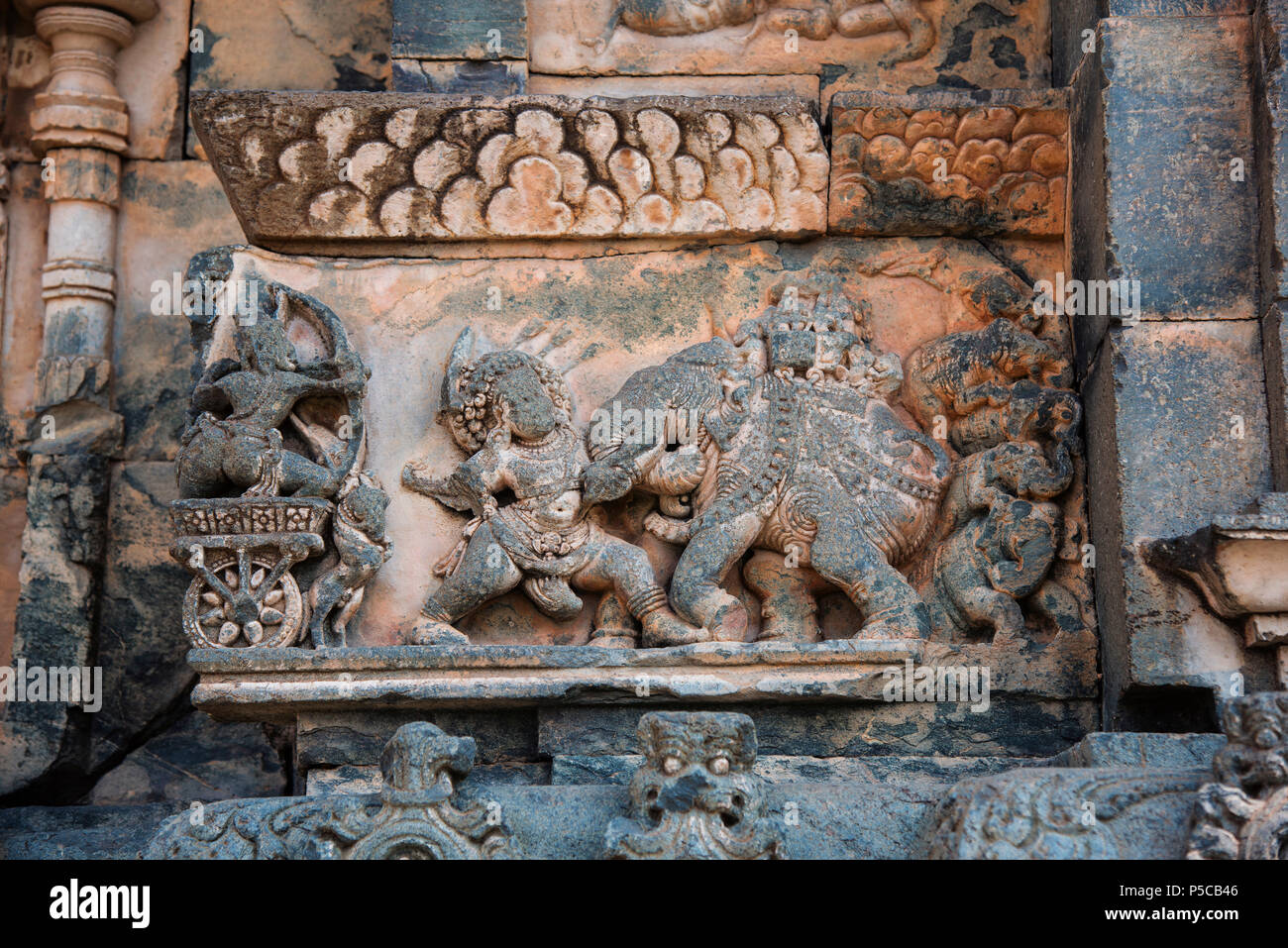 Bhima and Arjuna fighting with Bhagadatta outer wall of Kasivisvesvara Shiva temple, Lakkundi, Gadag, Karnataka, India Stock Photo