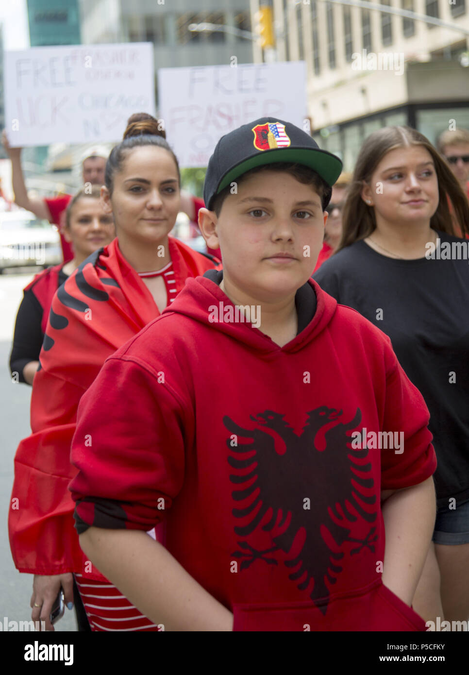 Proud energetic Albanian Americans march in the International Immigrants Parade along 6th Avenue in New York City. Stock Photo