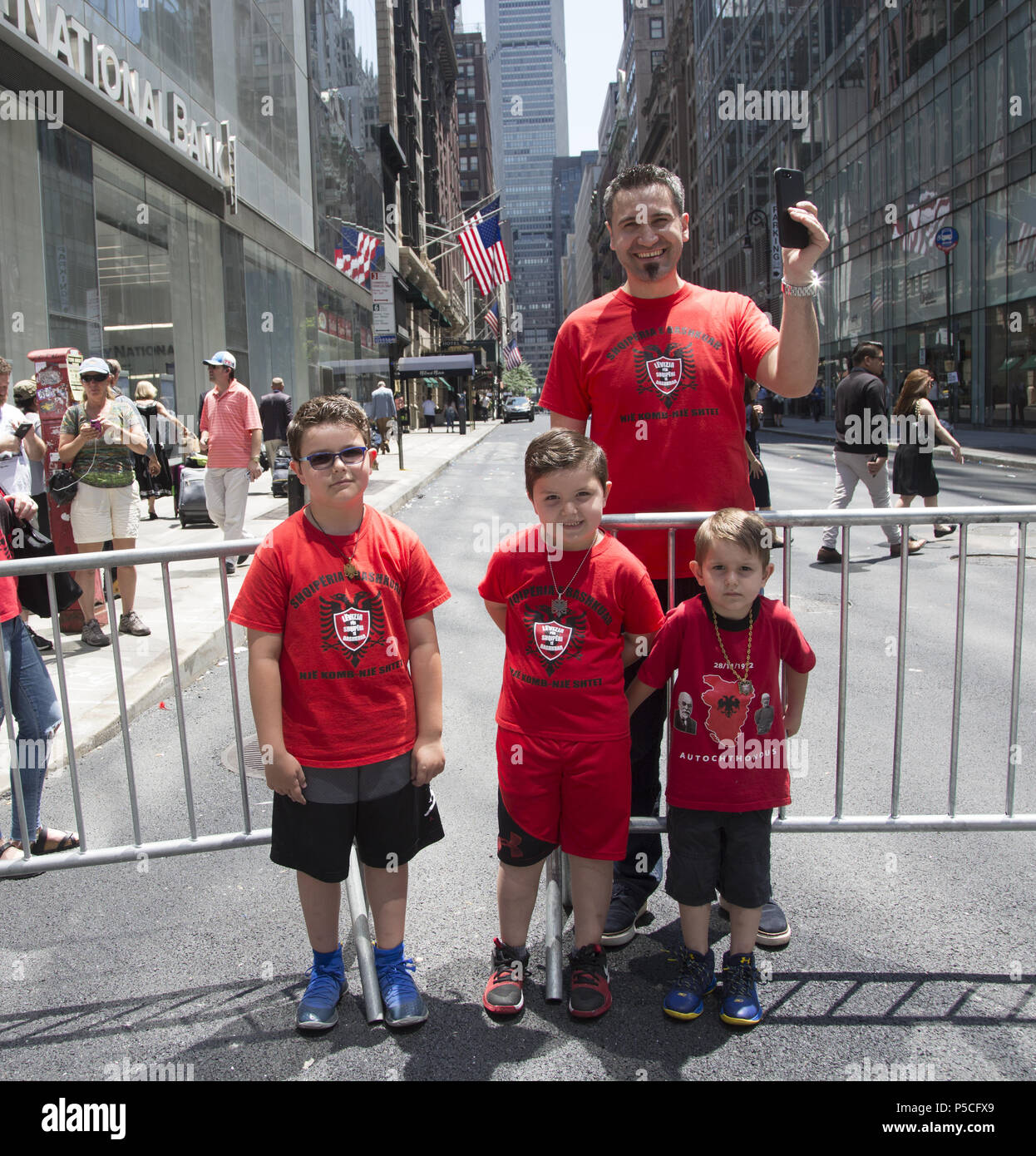 Proud energetic Albanian Americans march in the International
