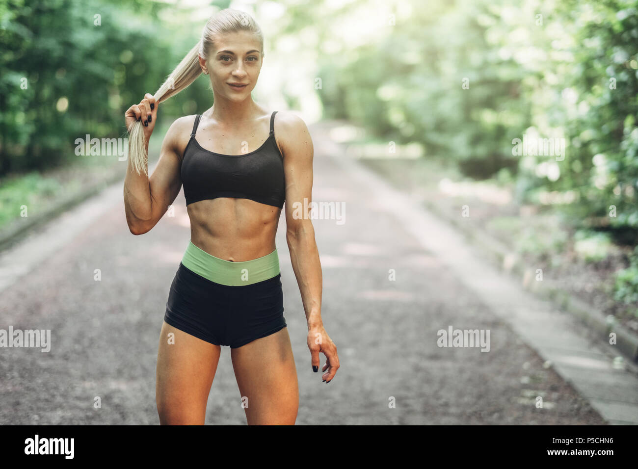Young Woman Running. Beautiful fit Girl. Fitness model outdoors. Weight  Loss Stock Photo - Alamy