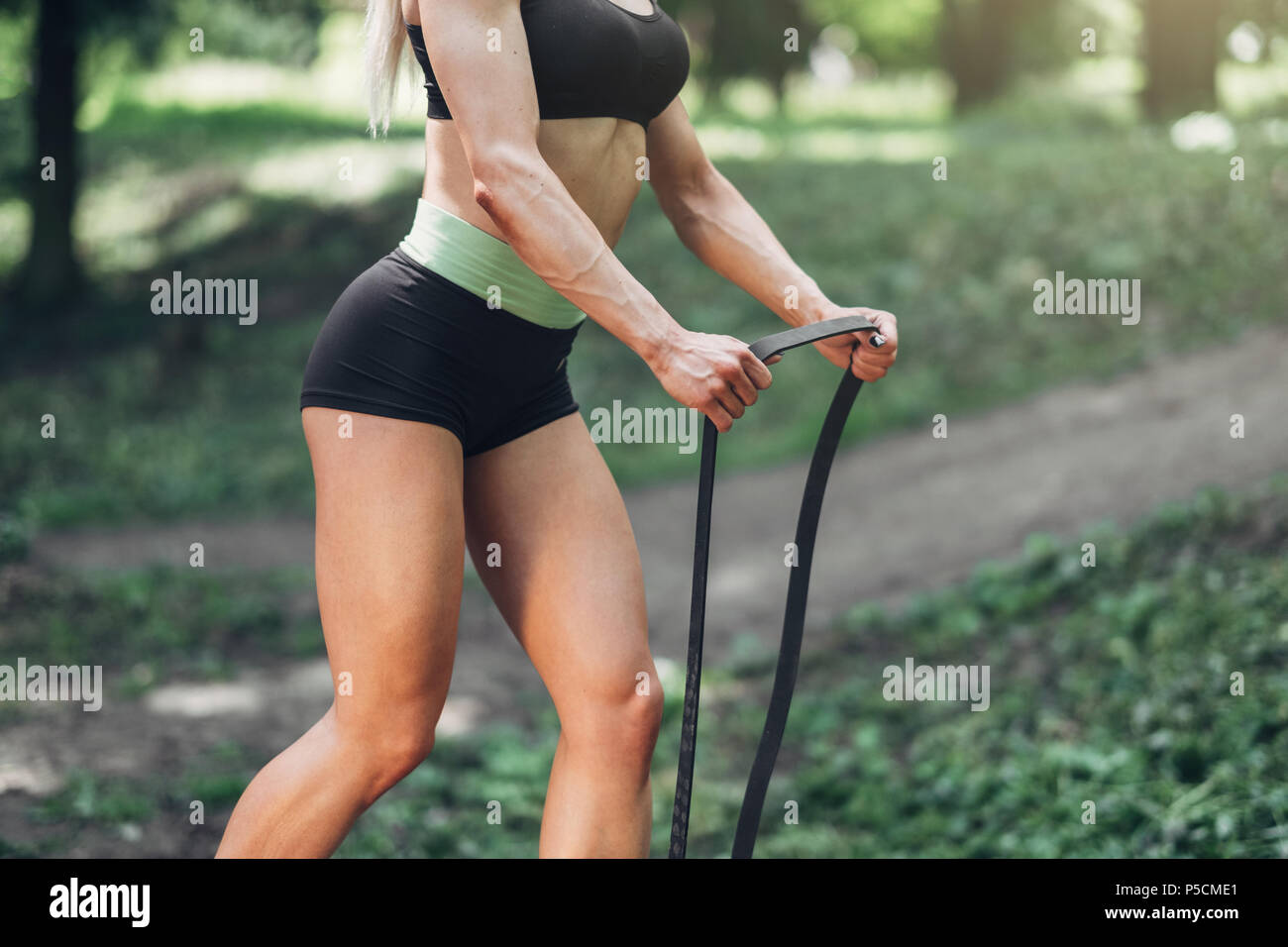 Fitness Woman Doing Training Workout Outdoor in Summer Morning Park. Concept Sport Healthy Lifestyle. Stock Photo