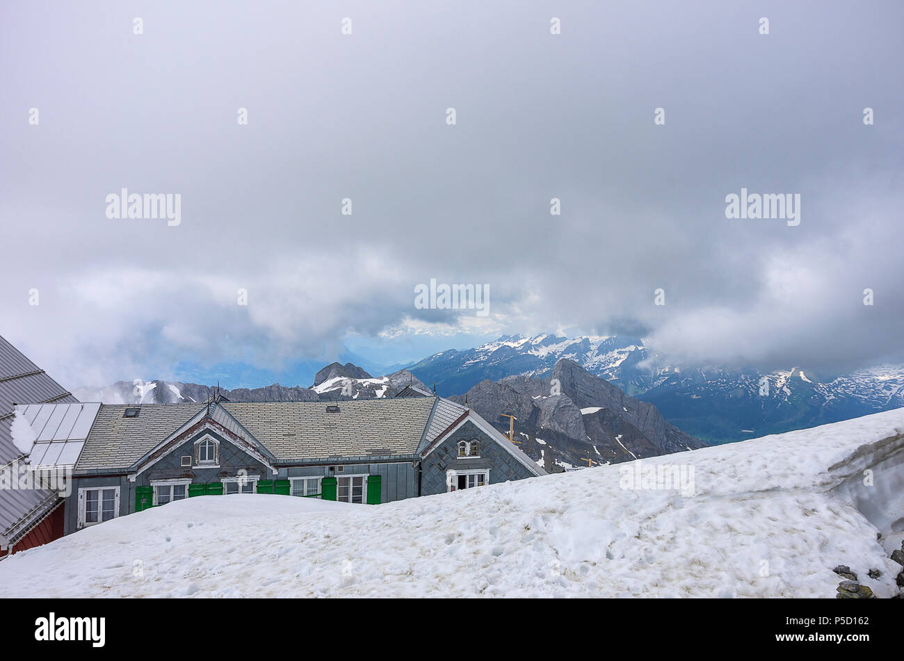 On the peak of Säntis Mountain, Appenzell Alps, Switzerland - mountain inn ALTER SÄNTIS. Stock Photo