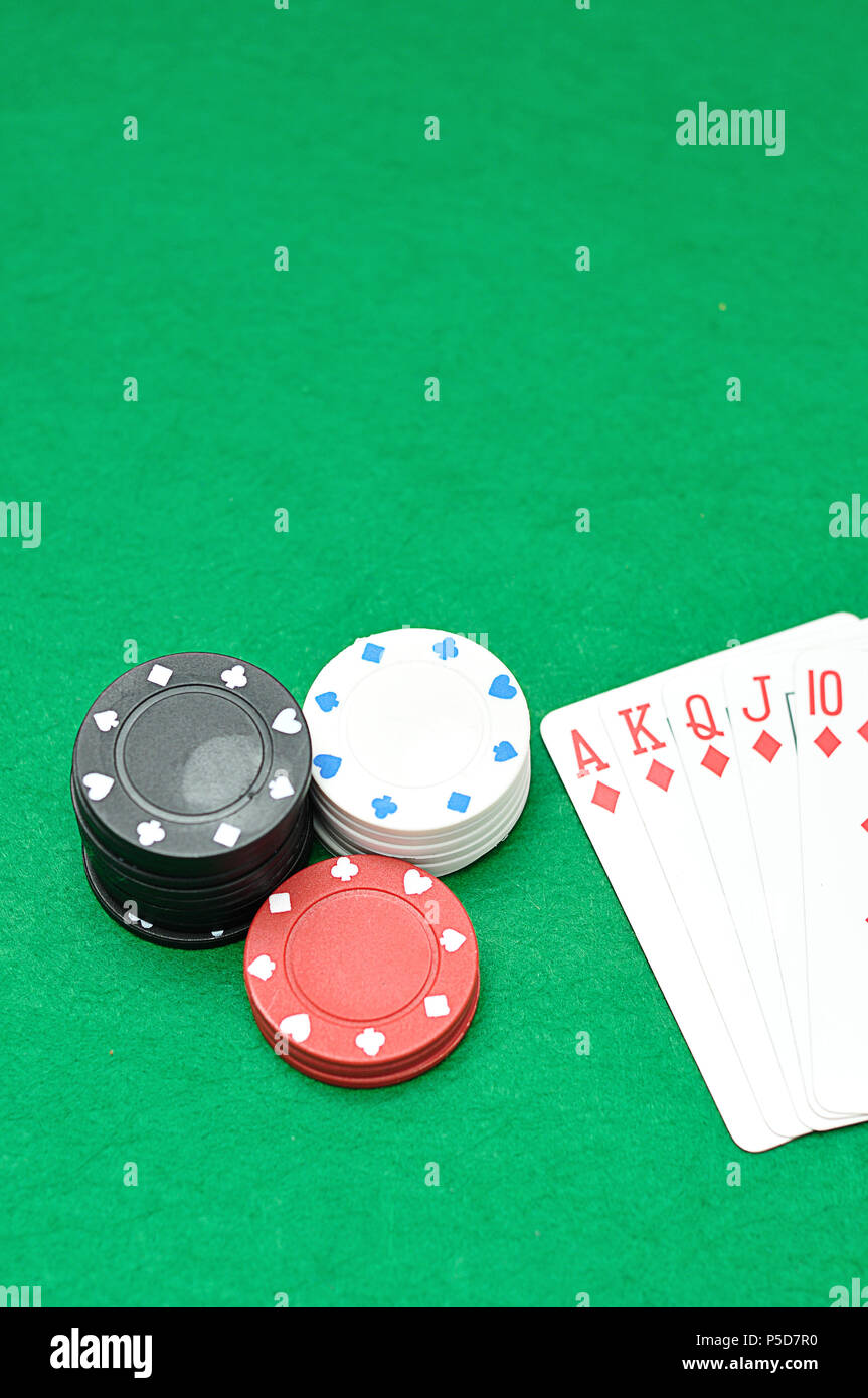 A stack of poker chips with a royal flush Stock Photo Alamy