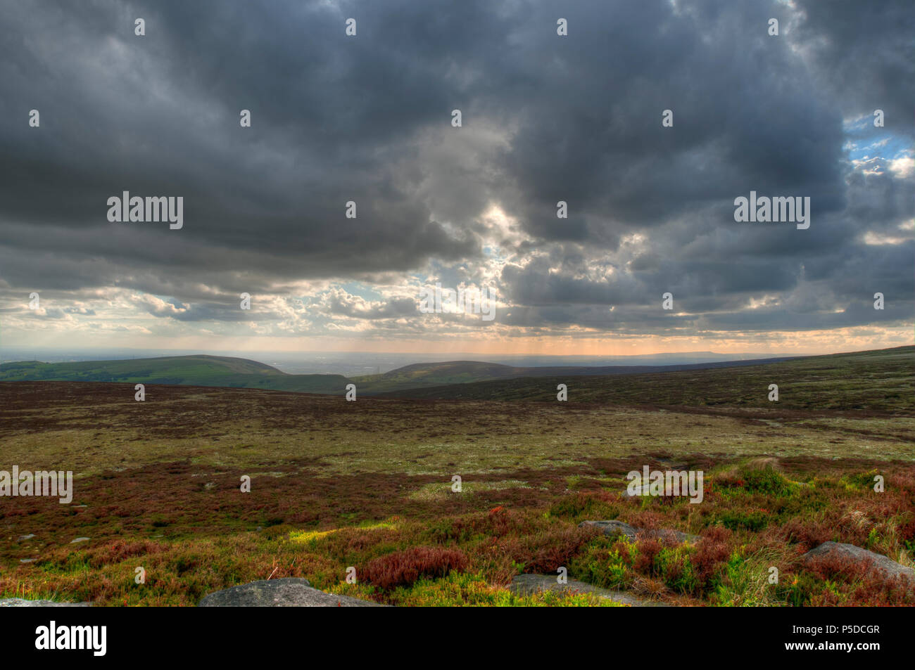 Looking out from near Glossop, Derbyshire across to Manchester, UK Stock Photo