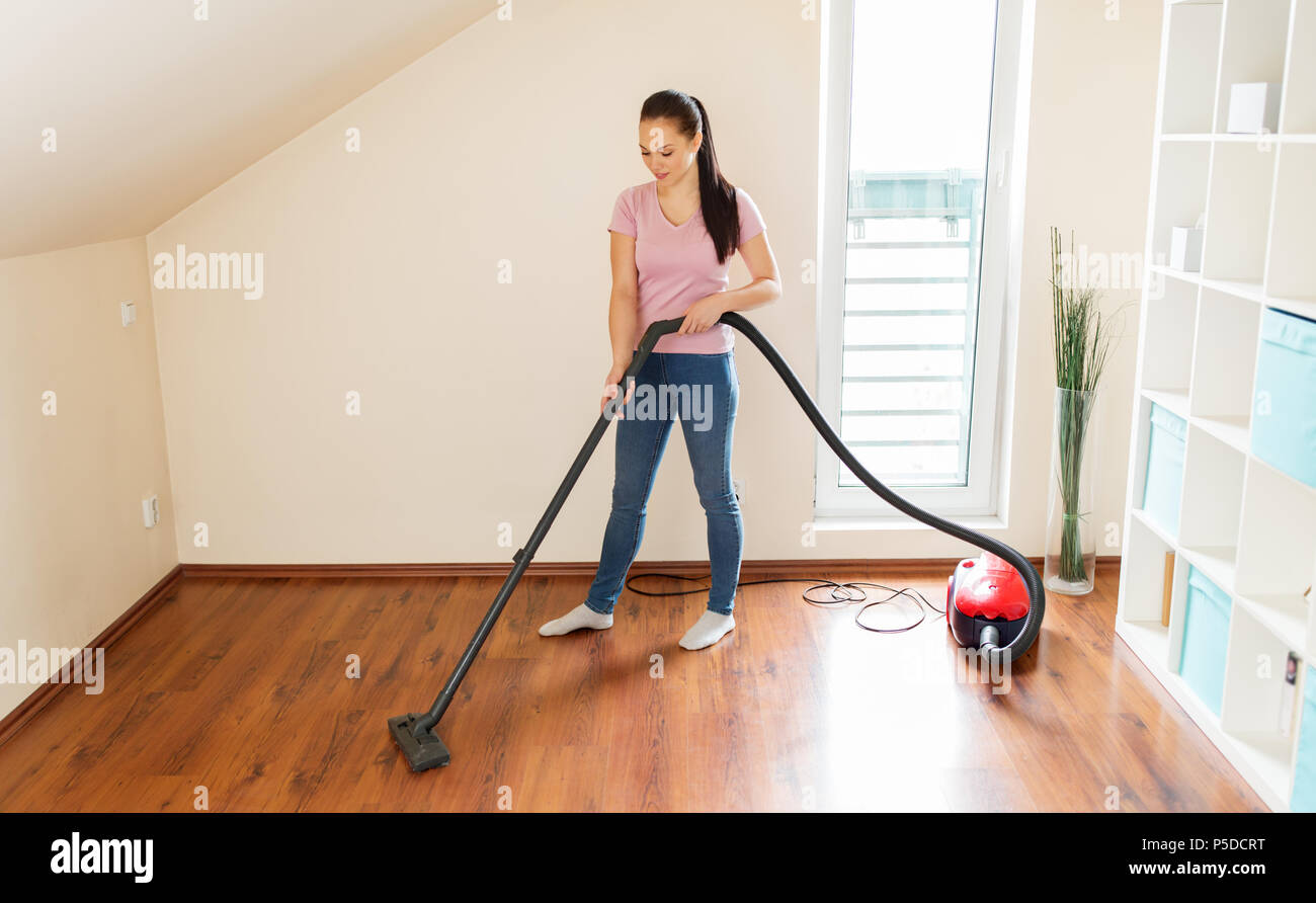 Woman hoover bedroom hires stock photography and images Alamy