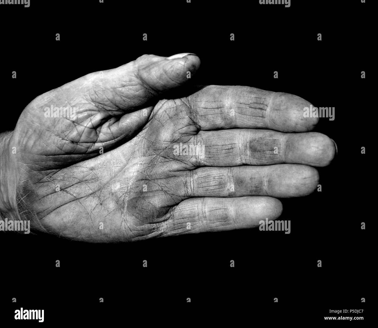 A black and white shot of a weathered character hand showing old skin. Stock Photo