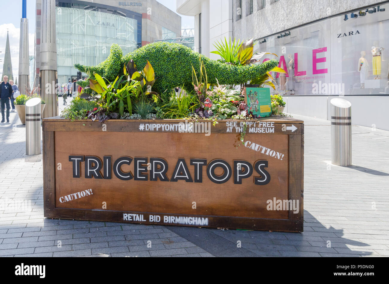 Plant troughs with dinosaurs made from plant displays to publicise Dippy on Tour, the Diplodocus,at Birmingham Museum and Art Gallery Stock Photo