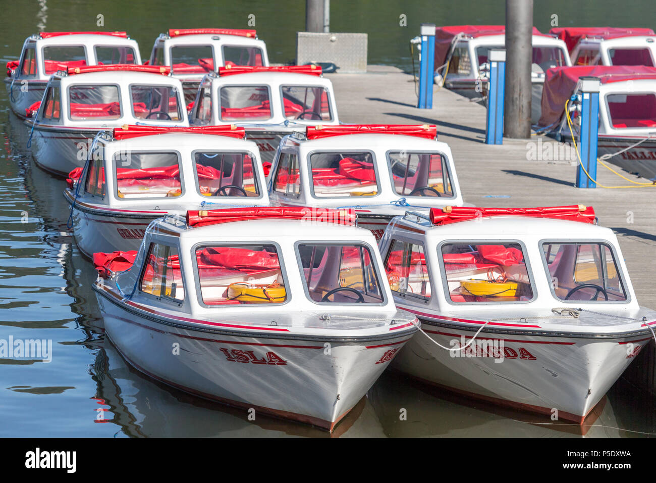 Electrical Powered motor boats for hire to tourists at Bowness-On Windermere in the English Lake District National Park Stock Photo