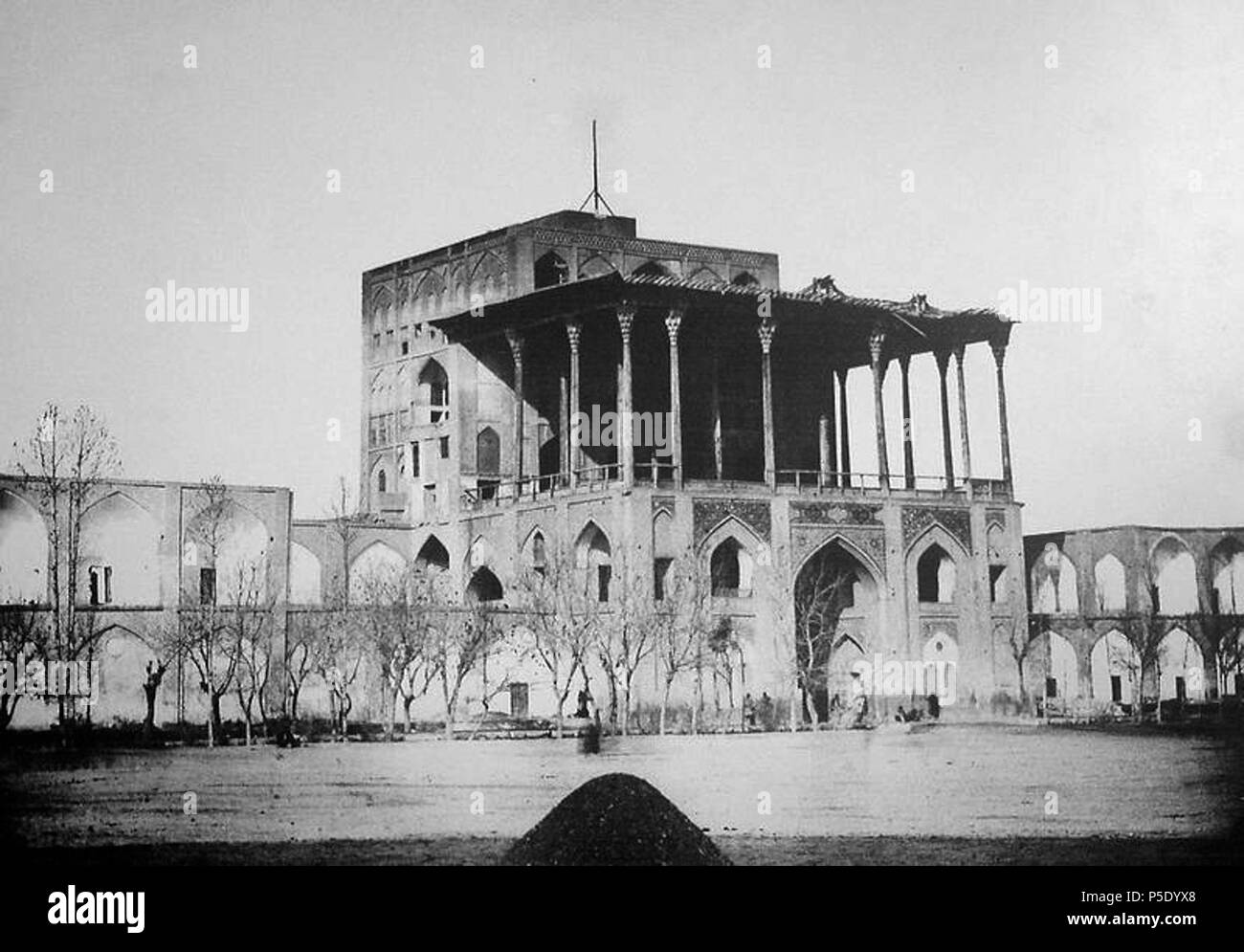 N/A. English: Ali-Qapu builging in Naqsh-e Jahan Square. 1885.   Ernst Hoeltzer  (1835–1911)     Description German telegraphist and photographer  Date of birth/death 7 January 1835 3 July 1911  Location of birth/death Kleinschmalkalden, Thuringian Forest, Germany Isfahan, Iran (Iran)  Work period 1835–1897  Work location Isfahan  Authority control  : Q122748 VIAF: 45407273 ISNI: 0000 0000 6687 4297 ULAN: 500075604 LCCN: n2007045754 GND: 130369551 WorldCat 85 Ali-Qapu-1885 Stock Photo