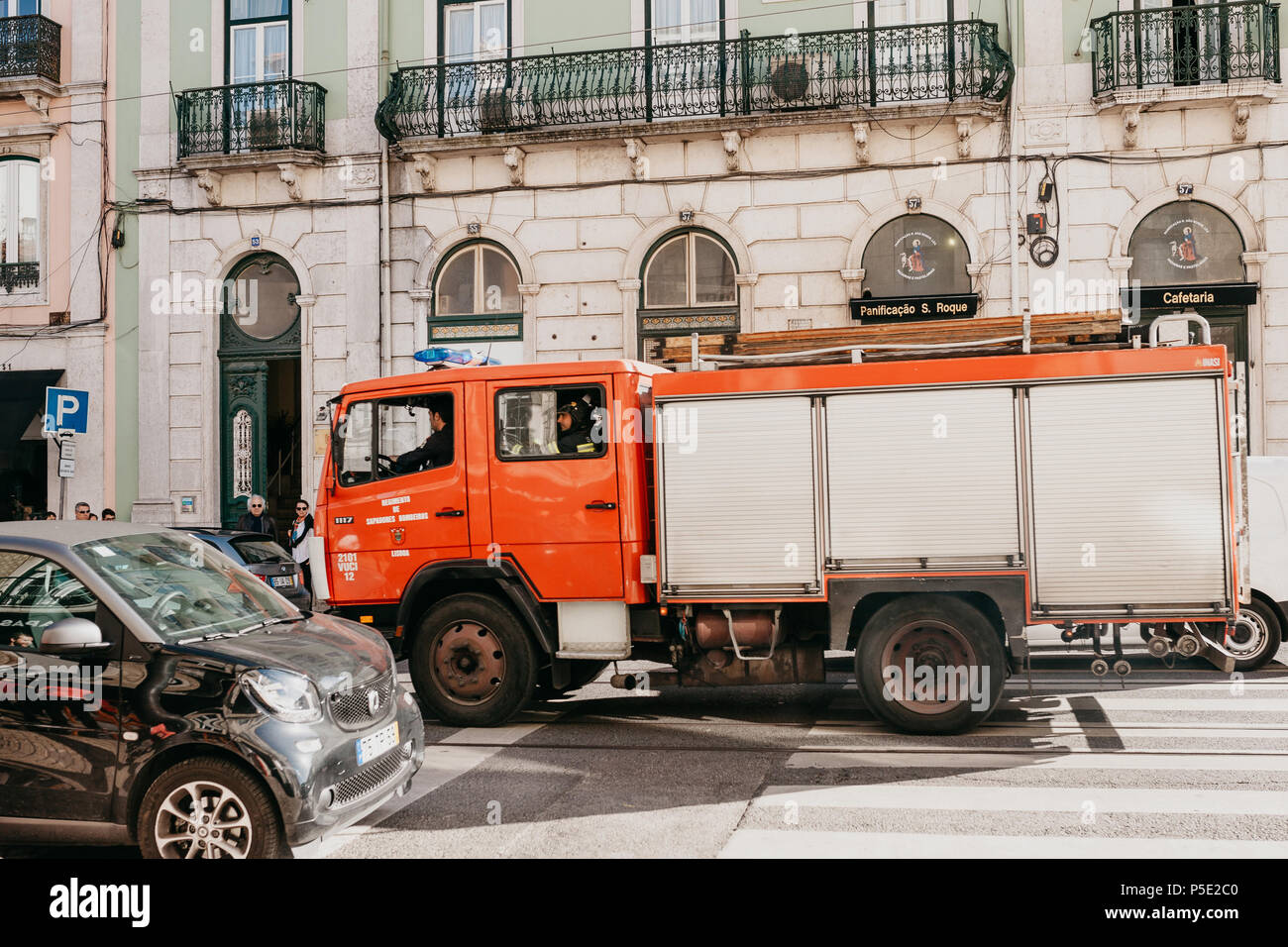 Portugal, Lisbon, May 1, 2018: A modern Portuguese fire truck is driving along a city street Stock Photo