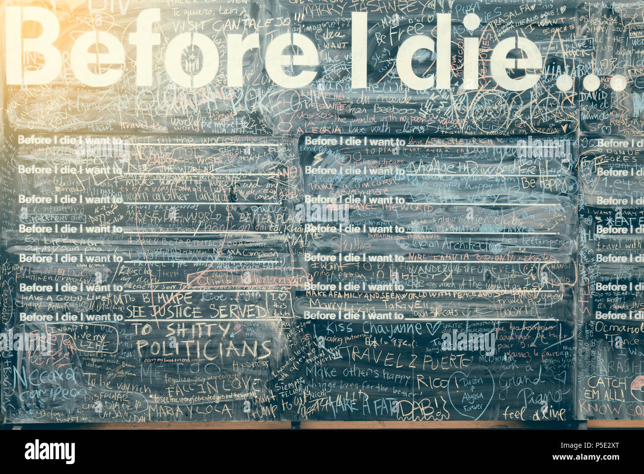 Before I die wall in Athens, Greece. Art project that invites people to contemplate death, reflect on life, and share their personal aspirations in pu Stock Photo