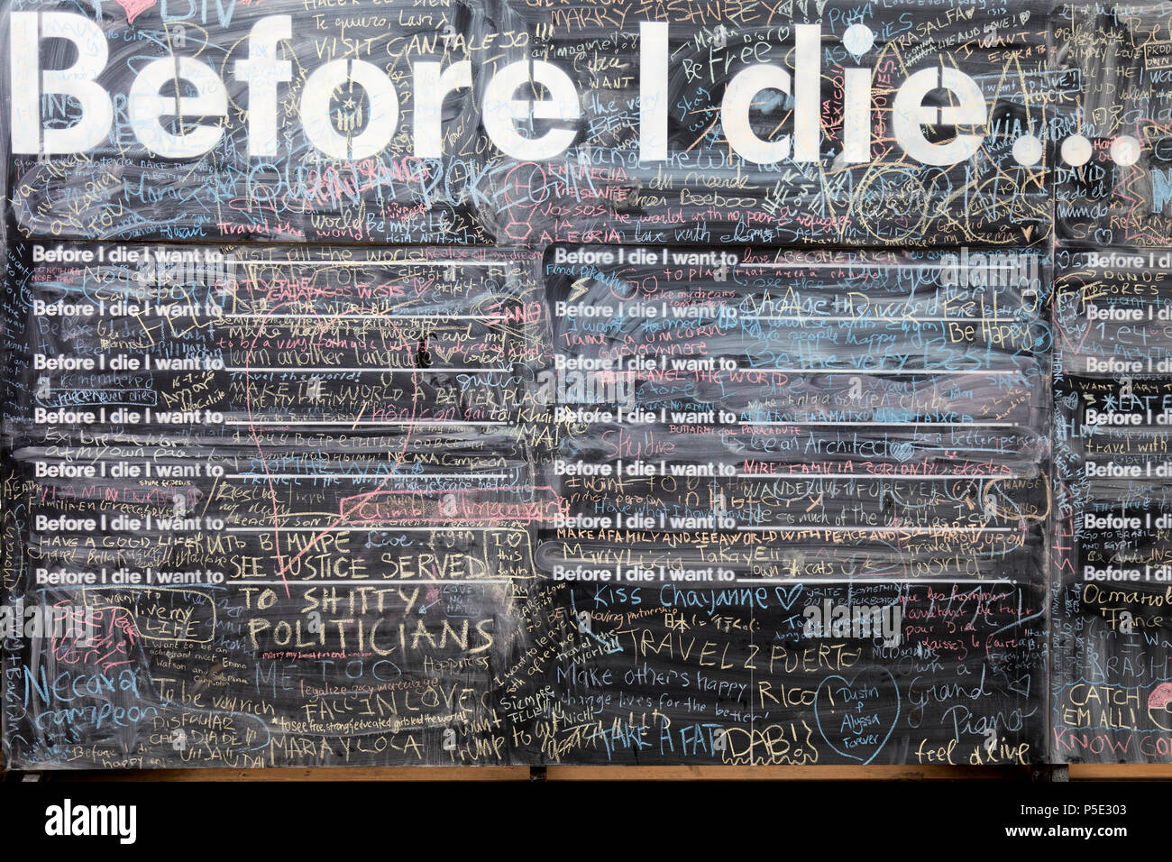 Before I die wall in Athens, Greece. Art project that invites people to contemplate death, reflect on life, and share their personal aspirations in pu Stock Photo