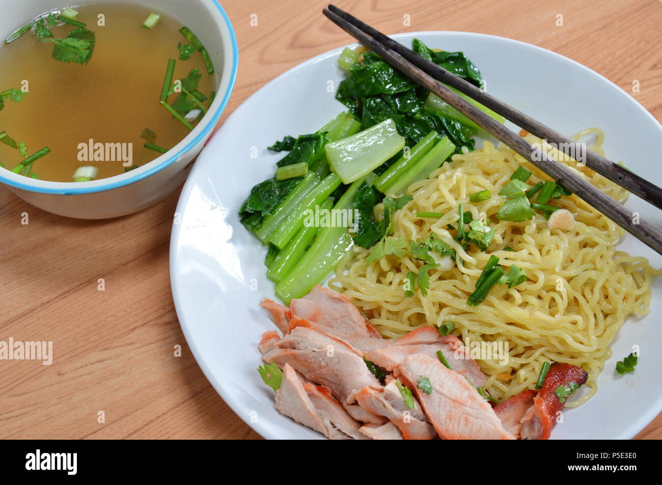 Chinese egg noodle with barbecue pork and soup Stock Photo Alamy