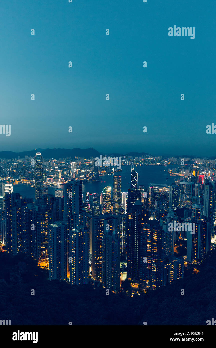 Hong Kong city skyline at evening dusk sunset Stock Photo - Alamy