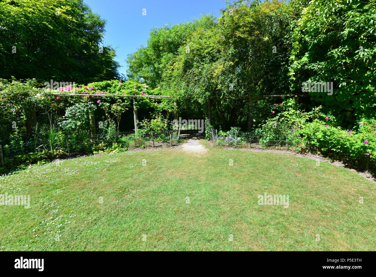 An English country garden in summertime. Stock Photo