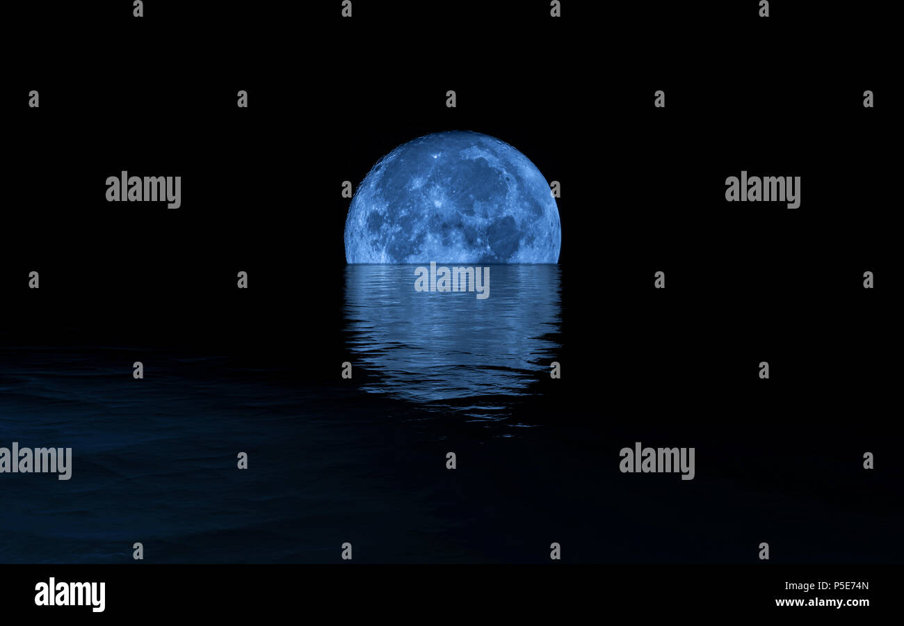 Full Moon Rising Over Calm Sea, blue tones Stock Photo