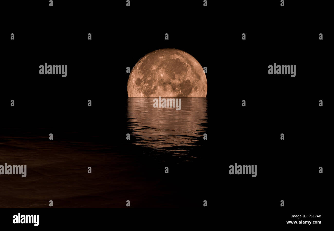 Full Moon Rising Over Calm Sea, warm tones Stock Photo