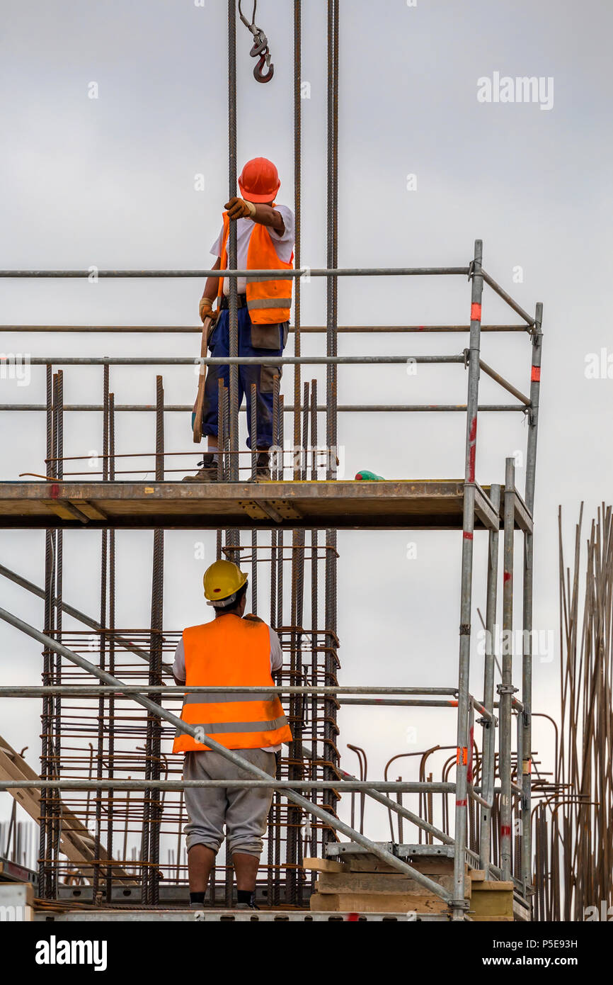 Reinforcement work with metal rods at construction site Stock Photo - Alamy