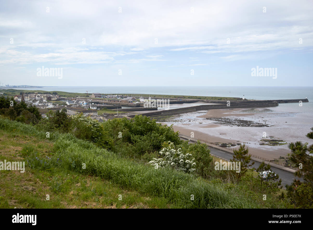 View down over Maryport harbour from the promenade site of the old roman fort Cumbria England UK Stock Photo