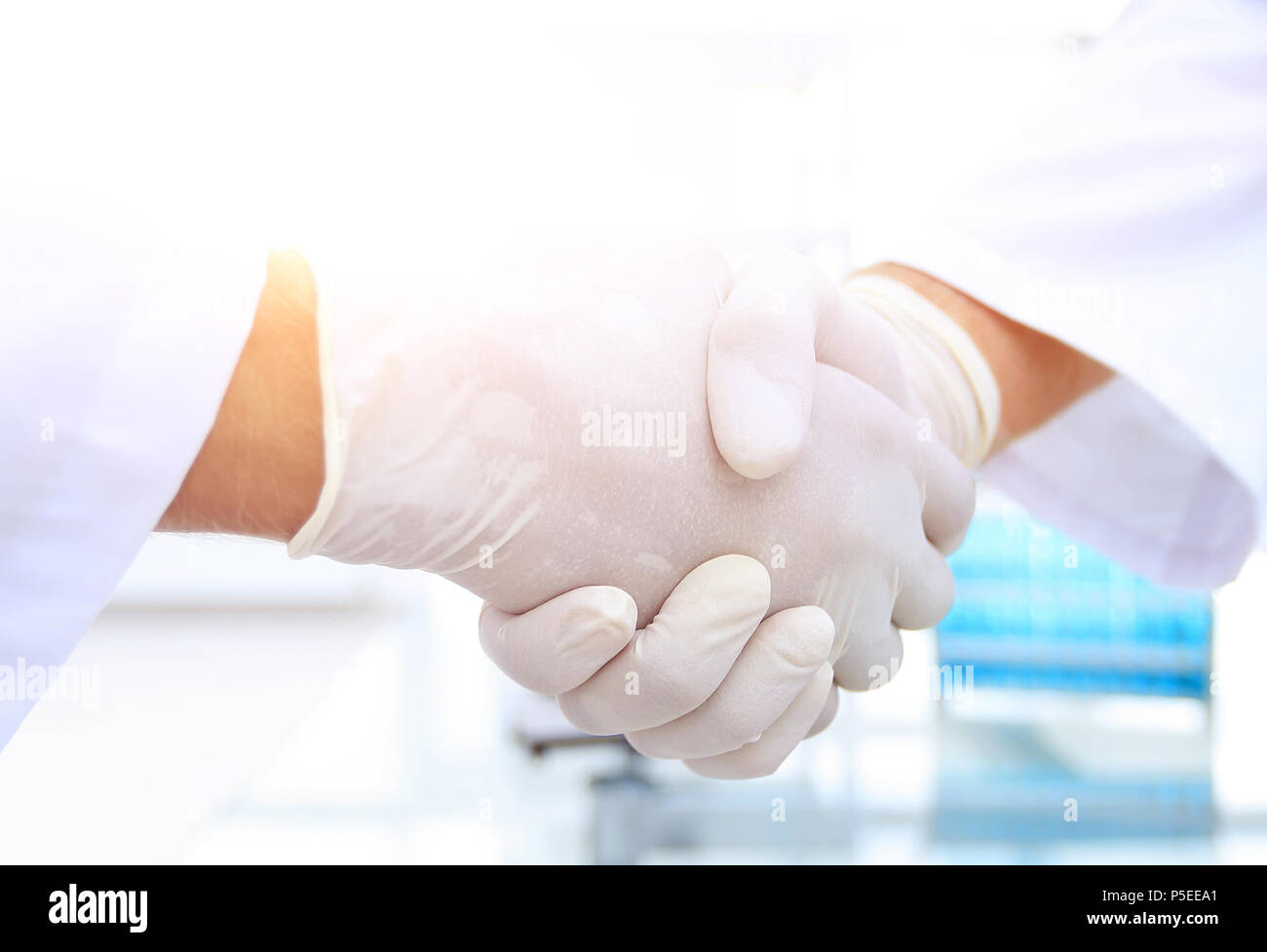 Medical gloves make shaking hands Stock Photo Alamy