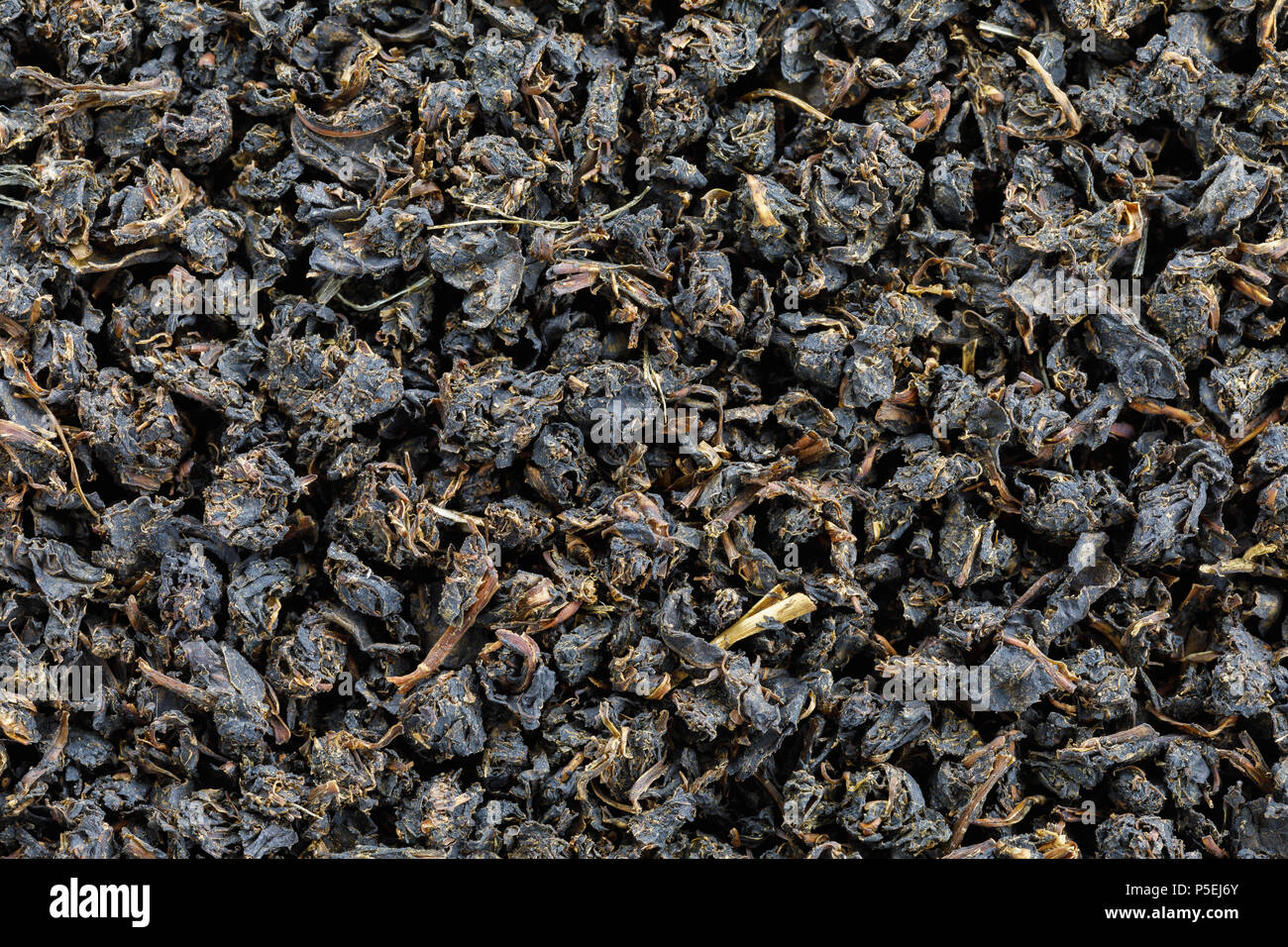 Texture of fermented and dried leaves of Ivan-tea close-up, top view Stock Photo
