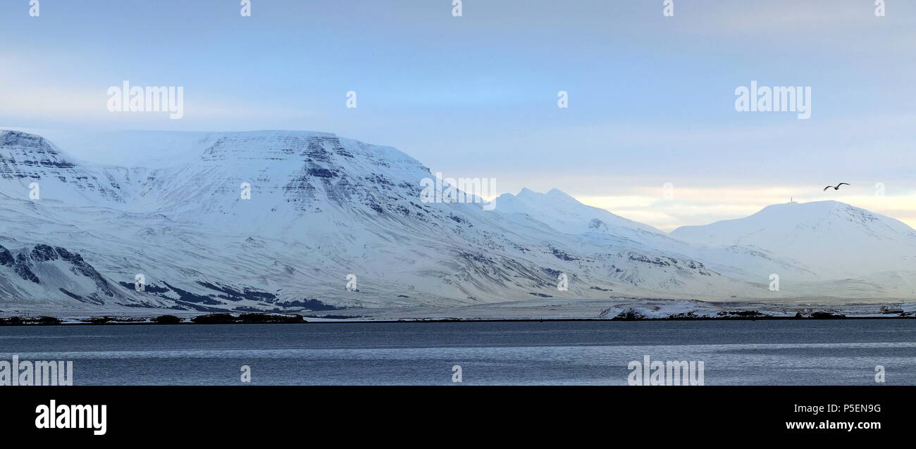 Reykjavik Harbour Landscape shot of the Sea and Mountains Iceland. Stock Photo