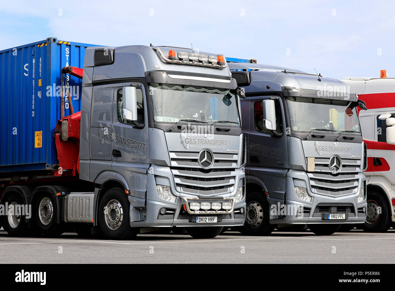 Front & side of Mercedes hgv transport logistics lorry truck & blue  articulated trailer advertising Amazon brand Prime service & logo on UK  motorway Stock Photo - Alamy
