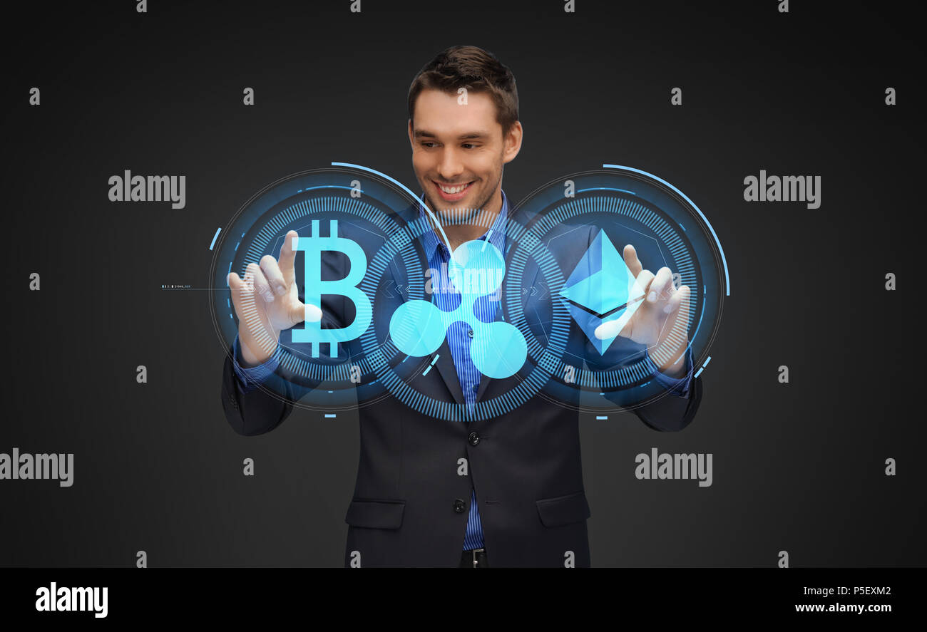 businessman with cryptocurrency holograms Stock Photo