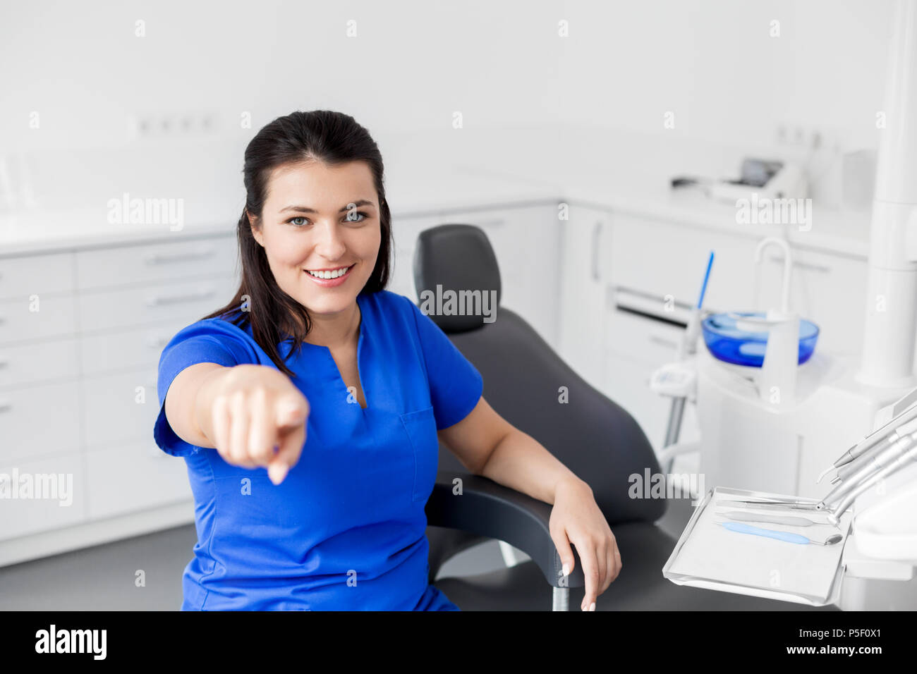 female dentist or nurse at dental clinic office Stock Photo Alamy