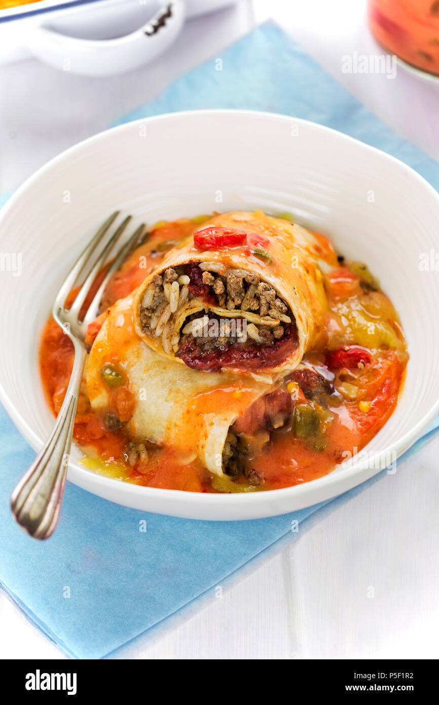 Beef enchiladas with tomato sauce and cheese Stock Photo Alamy