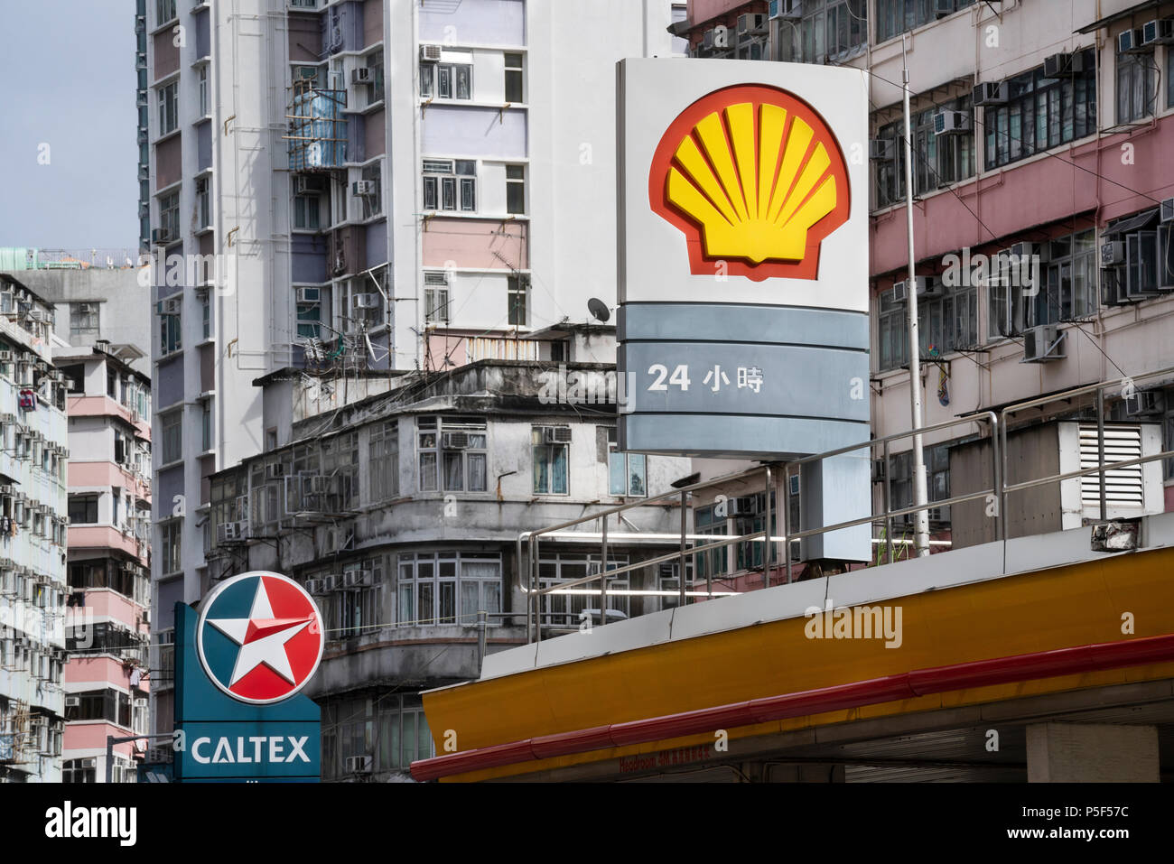 A Shell and Caltex gas stations in Sham Shui Po, Hong Kong. Stock Photo