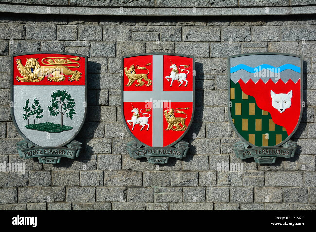 Canadian provincial coats of arms for the provinces of PEI, Newfoundland and the Northwest Territory. Stock Photo