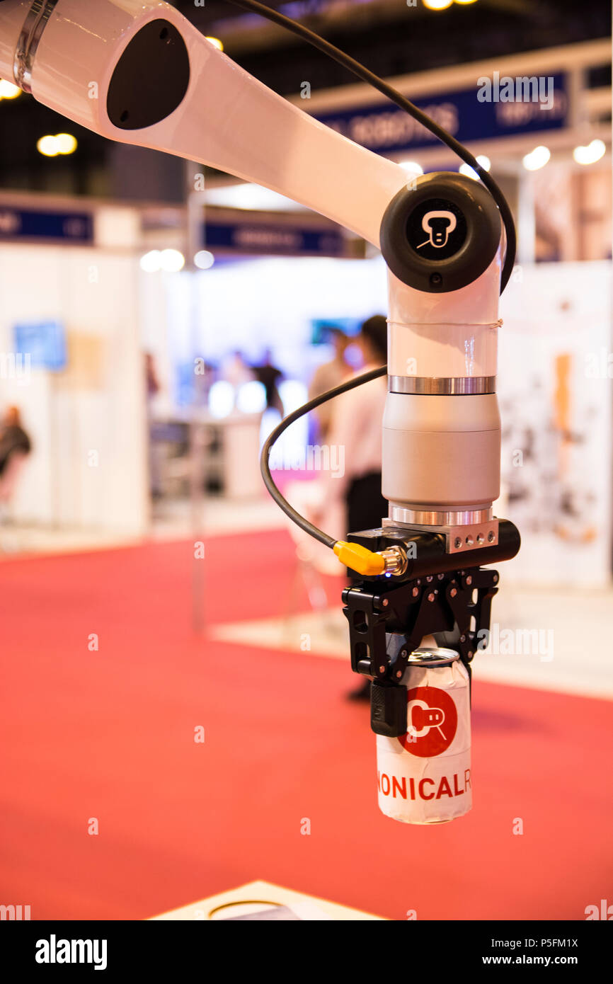 Elfin collaborative robotic arm holding a can from Canonical Robots