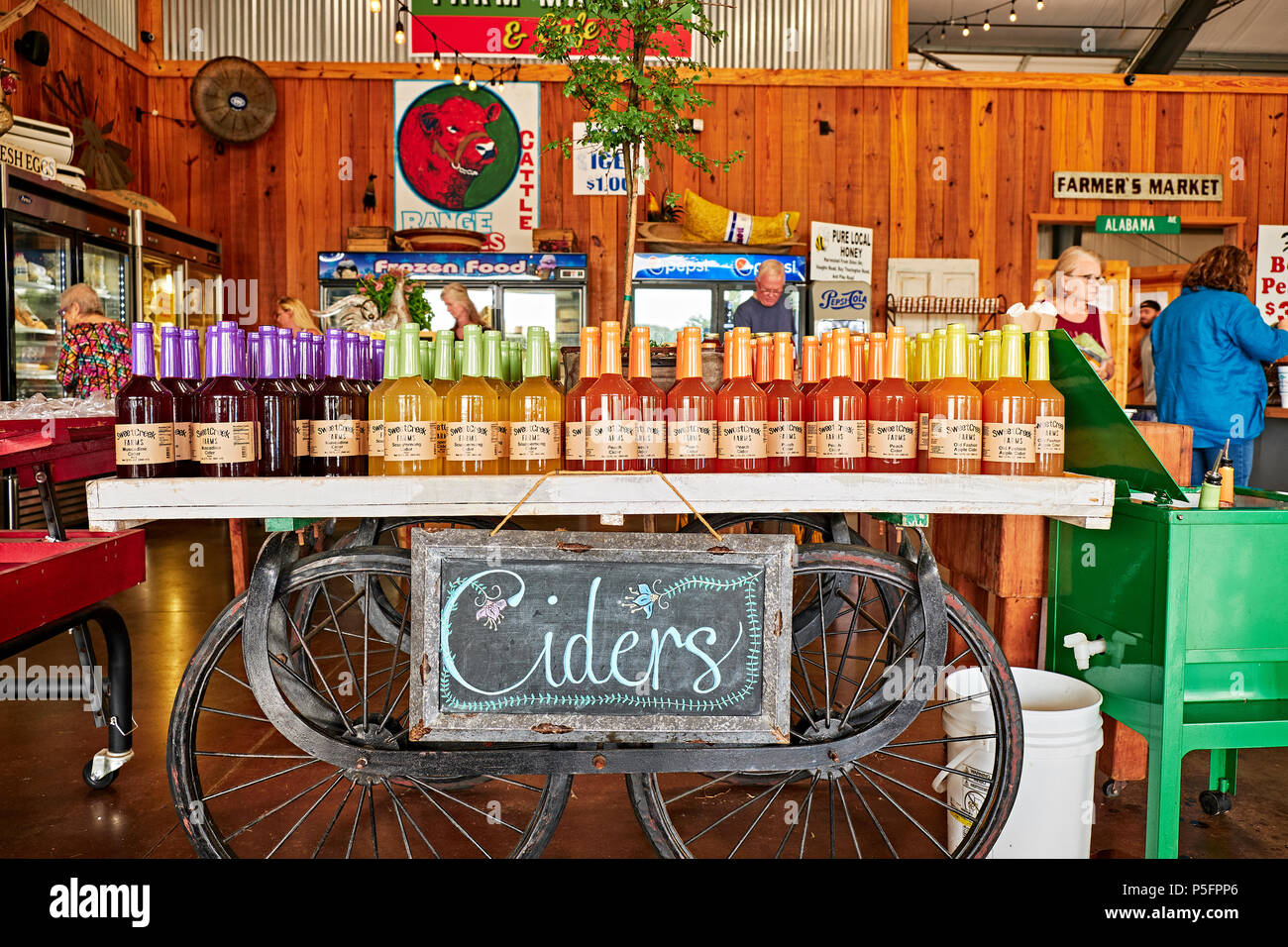 Rural country store display of old fashion apple cider, peach cider and muscadine cider in Pike Road Alabama, USA. Stock Photo