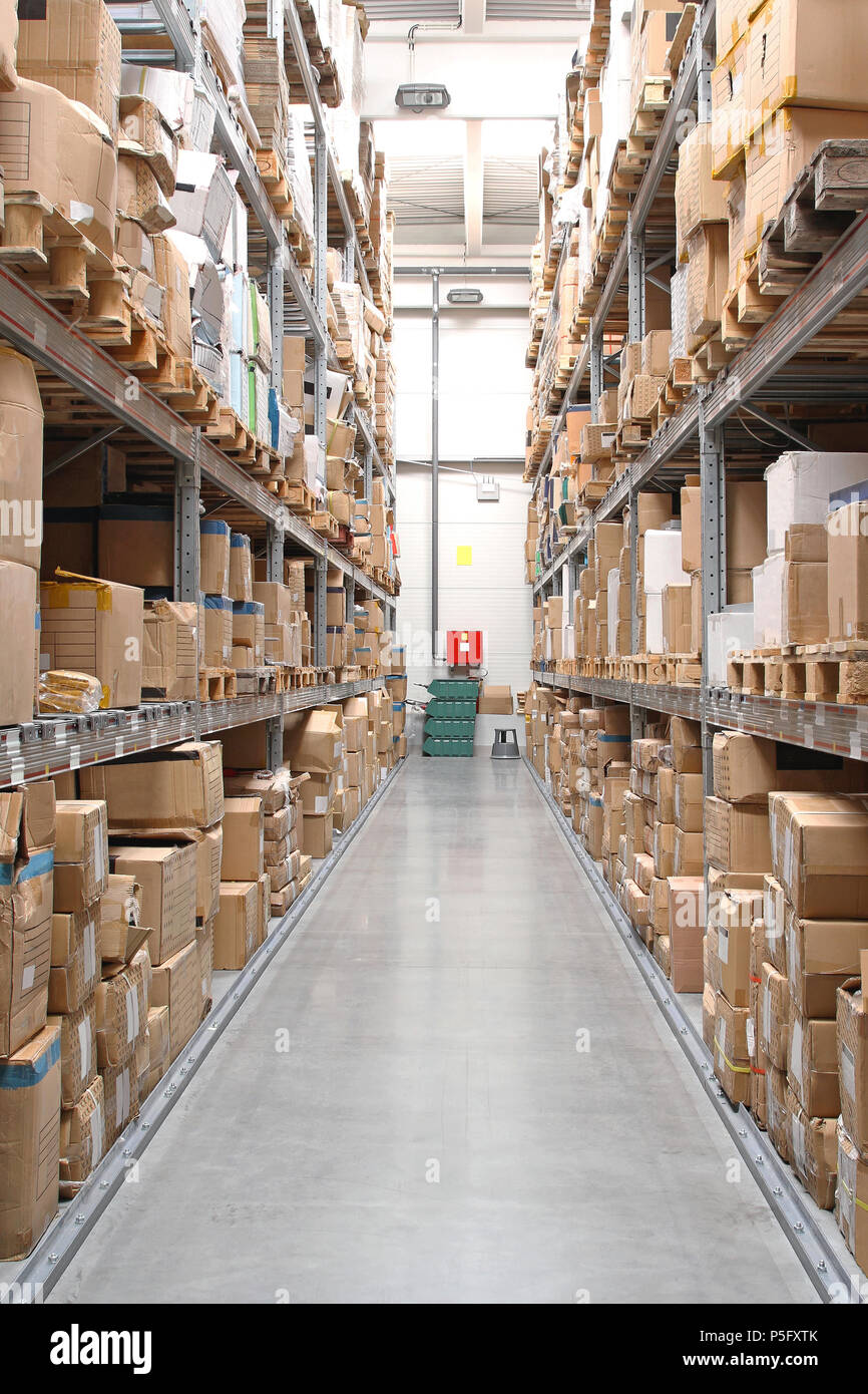 Warehouse Rows With Cardboard Boxes and Goods at Shelves Stock Photo ...