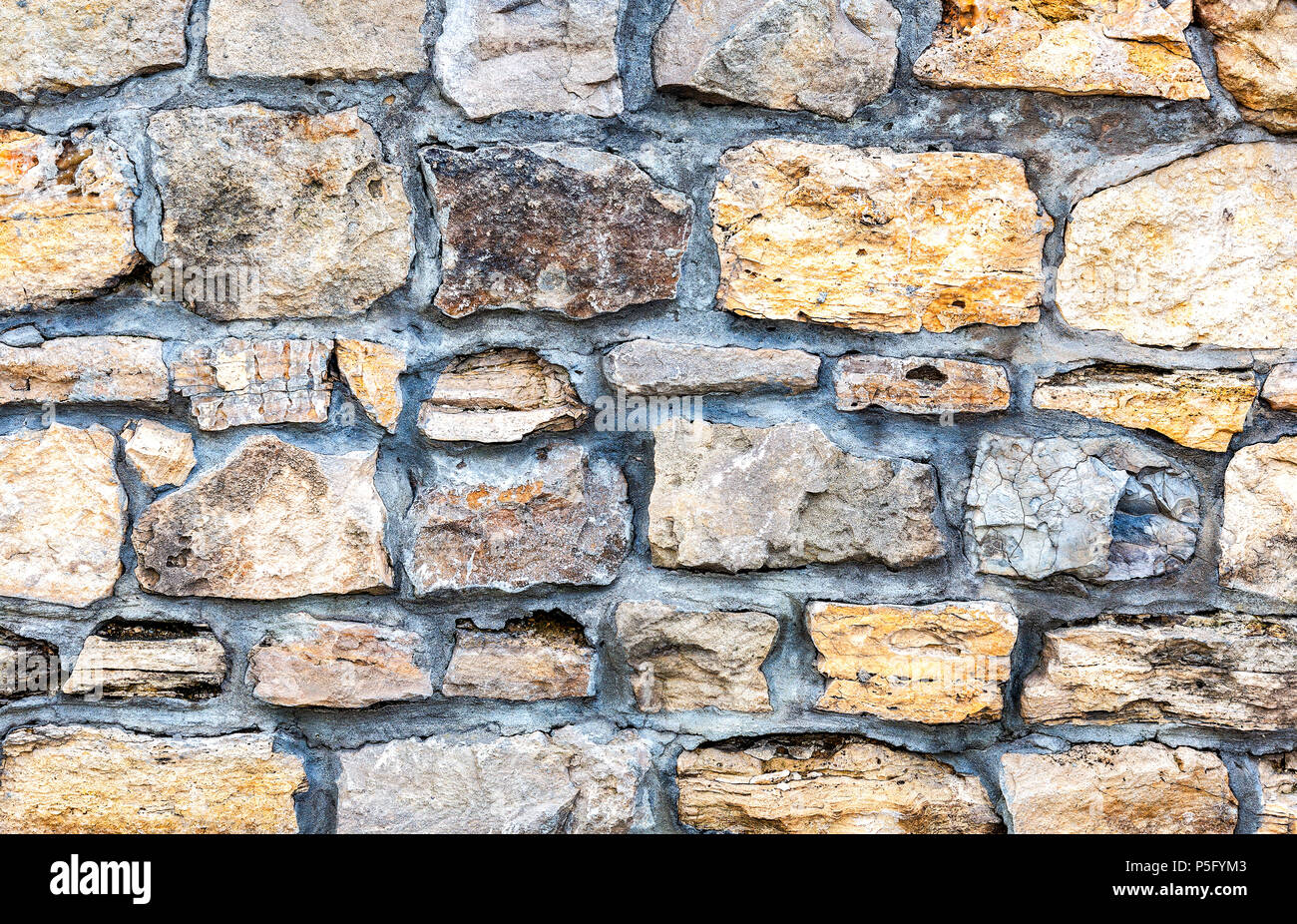 Weathered grey stone wall as creative background texture Stock Photo ...