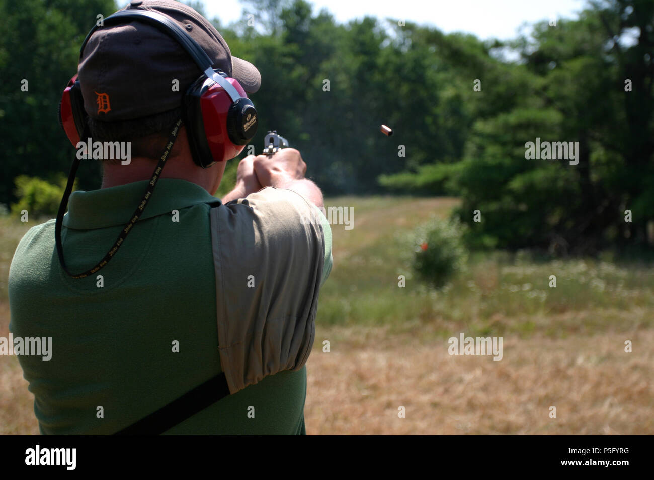 Empty Cartridge Case Ejecting from a Pistol 9mm Handgun Stock Photo Alamy