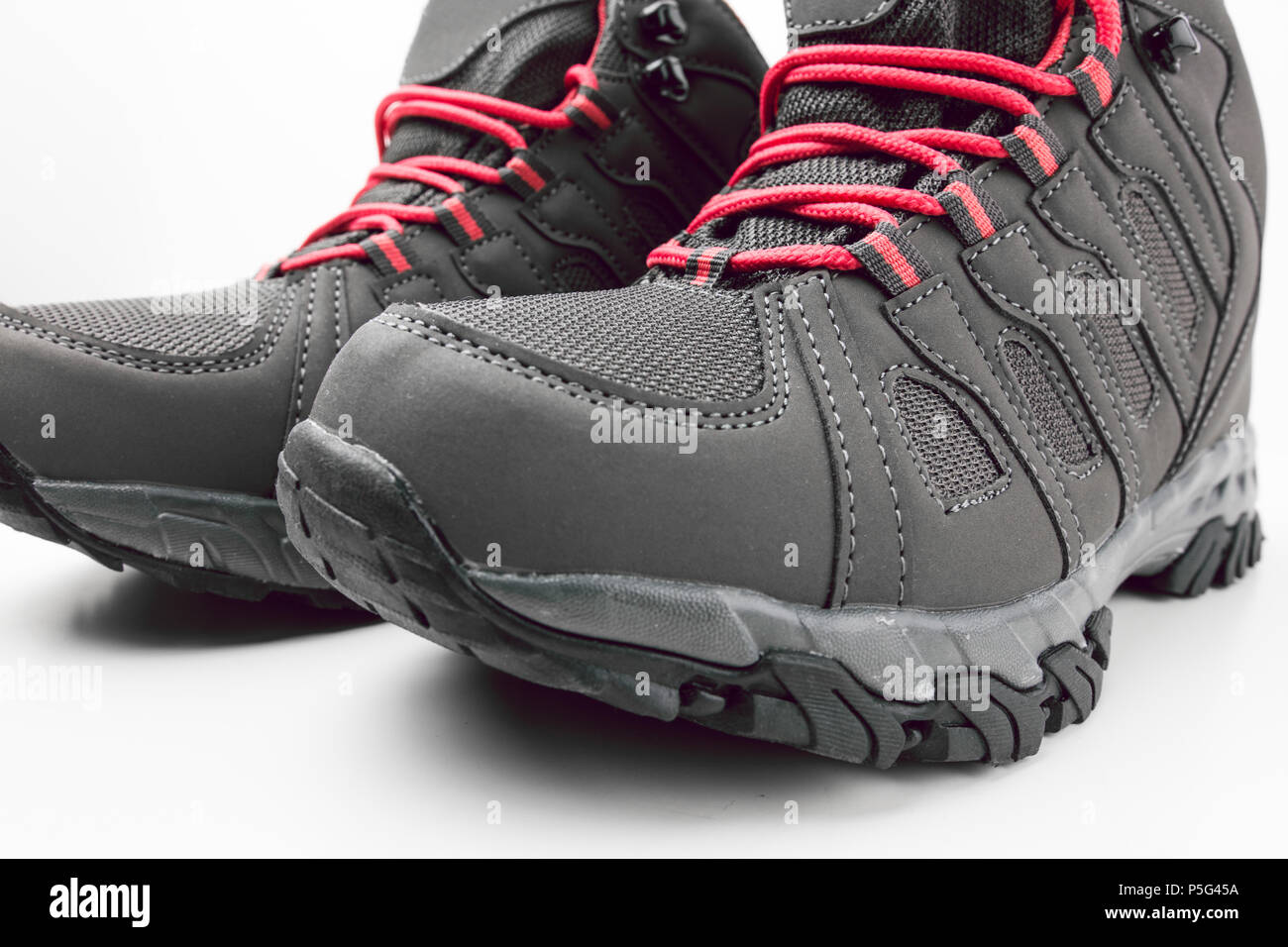 new-hiking-shoes-with-red-straps-on-white-background-hiking-running-lifestyle-P5G45A.jpg