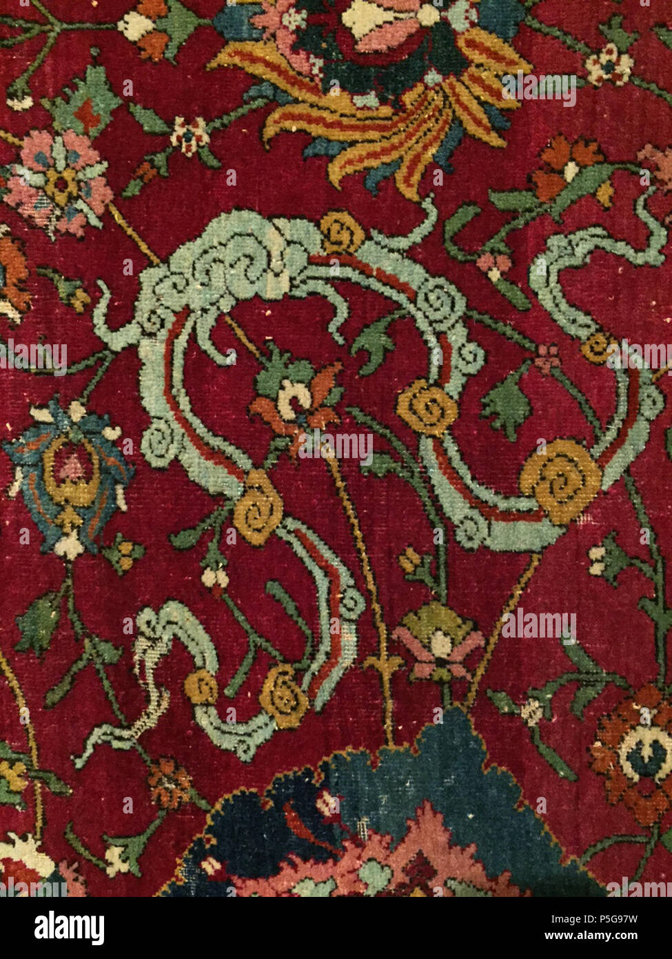 N/A. English: Detail of a Persian Animal carpet, Safavid period, Persia, 16th century . 11 September 2015, 11:25:48. Safavid Court Manufacture, 16th cenury 354 Cloud band Hamburg MKG Safavid animal carpet detail Stock Photo