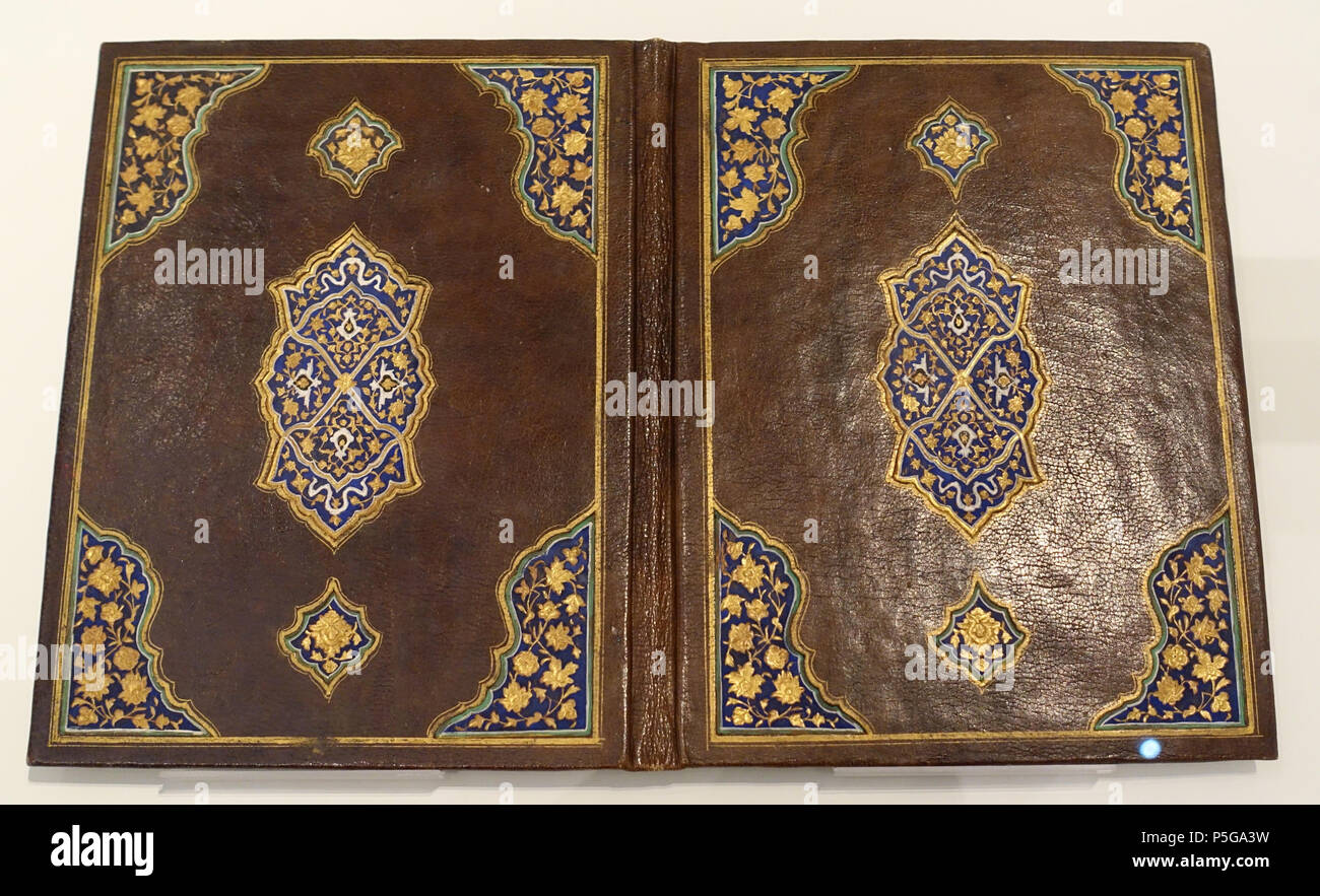 N/A. English: Exhibit in the Aga Khan Museum - Toronto, Canada. This work is old enough so that it is in the . Photography was permitted in the museum without restriction. 6 October 2015, 12:52:16. Daderot 221 Book binding, Iran, 19th century AD, leather, paper, colour, gold - Aga Khan Museum - Toronto, Canada - DSC07037 Stock Photo