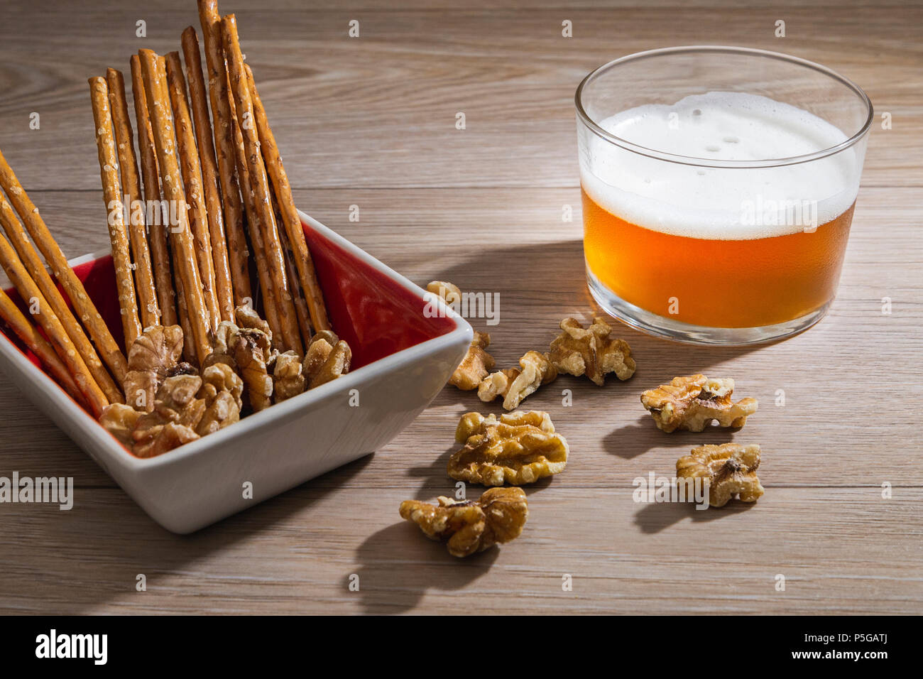 Appetizer with beer and nuts Stock Photo