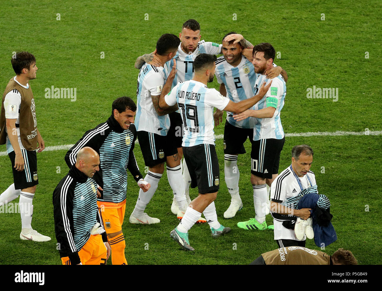 Argentina's Lionel Messi (right), Sergio Aguero (front), Marcos Rojo (left), Nicolas Otamendi (back) and Gabriel Mercado (2) celebrate after the final whistle during the FIFA World Cup Group D match at Saint Petersburg Stadium. Stock Photo