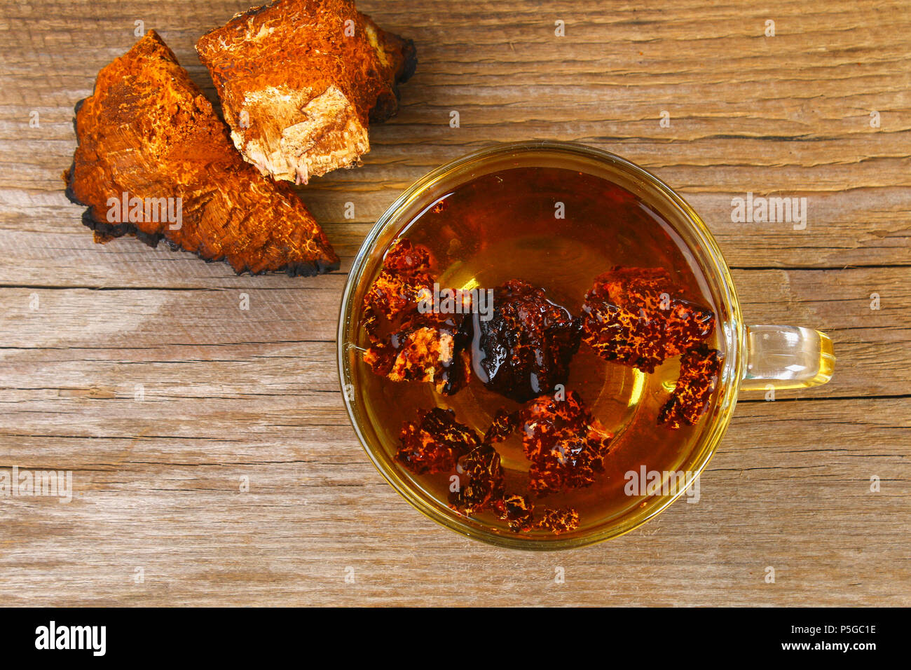 Healing tea from birch mushroom chaga is used in folk medicine Stock ...