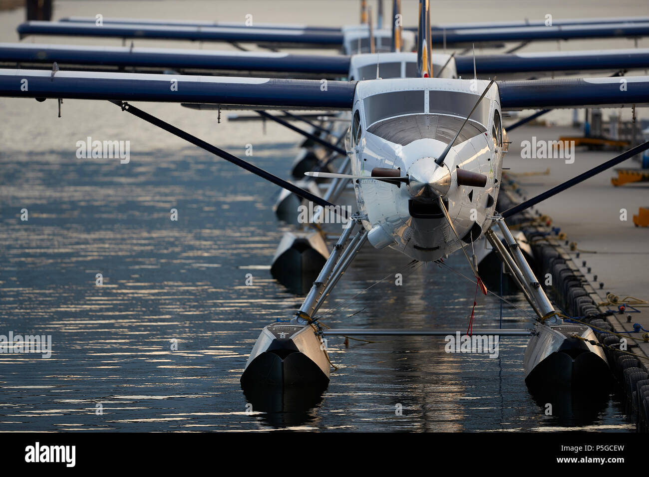 Harbour Air Seaplanes de Havilland Canada DHC-3-T Turbo Otter Fleet Moored At The Vancouver Harbour Flight Centre, British Columbia, Canada. Stock Photo