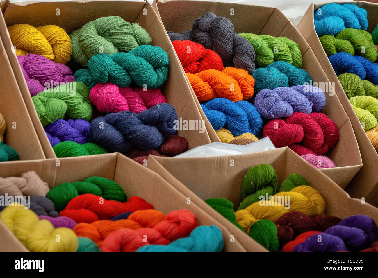 Multicolored Yarns Of Wool For Knitting In Shop Stock Photo - Download  Image Now - Ball Of Wool, Shelf, Storage Room - iStock