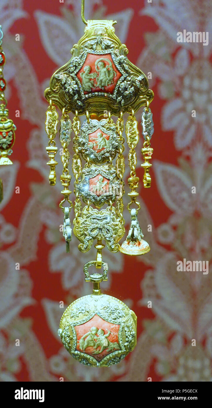 N/A. English: Exhibit in the Cinquantenaire Museum - Brussels, Belgium. 22 April 2016, 08:11:11. Daderot 335 Chatelaine with watch, signed Julien Le Roy, Paris, c. 1750, gold, diamonds, enamel - Cinquantenaire Museum - Brussels, Belgium - DSC08924 Stock Photo