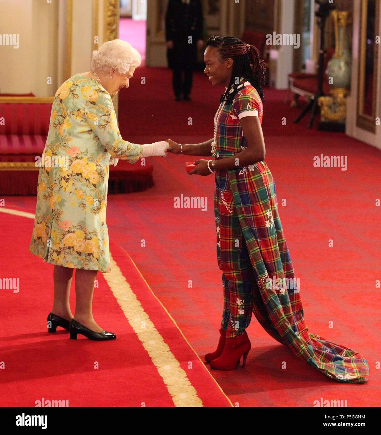 Ms Lakeyia Joseph from Dominica receives her Young Leaders Award from