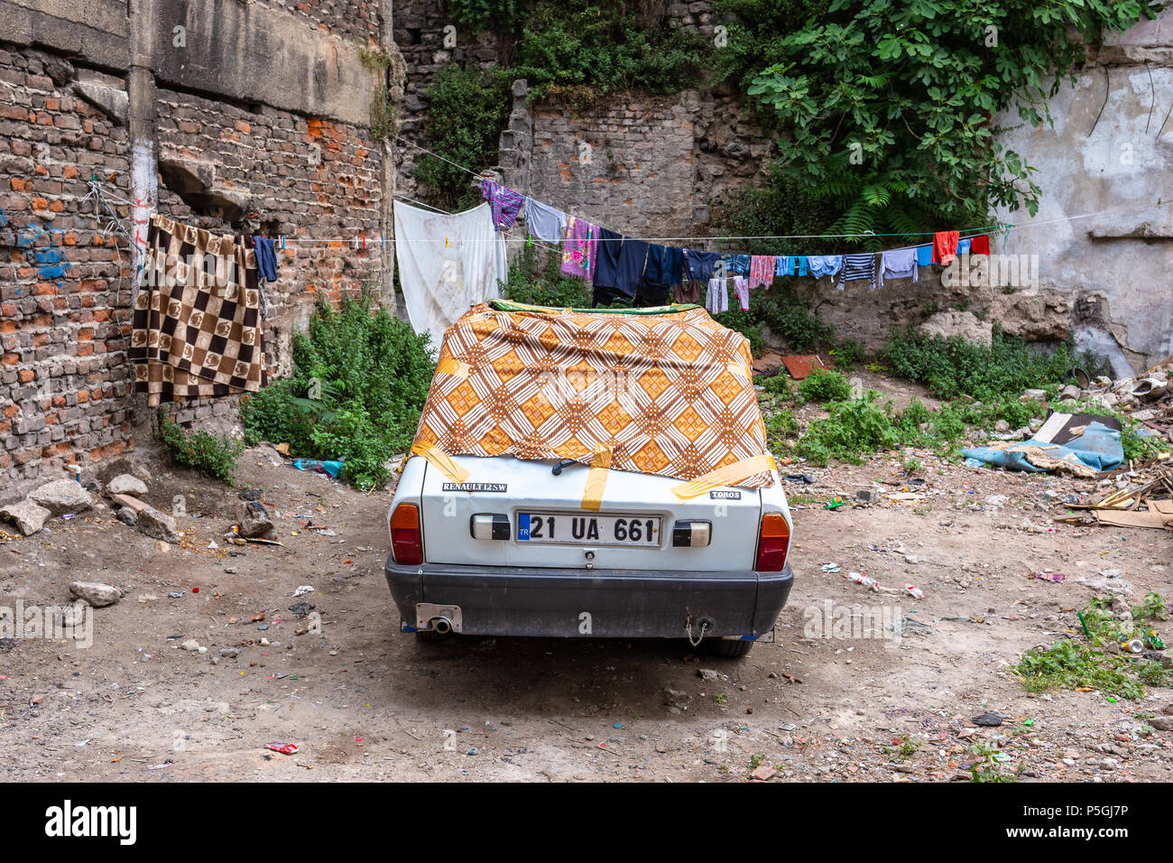 Residents prepare for the storm by covering their cars with blankets or protective materials expect strong thunder, heavy hail in Istanbul, Turkey. Stock Photo
